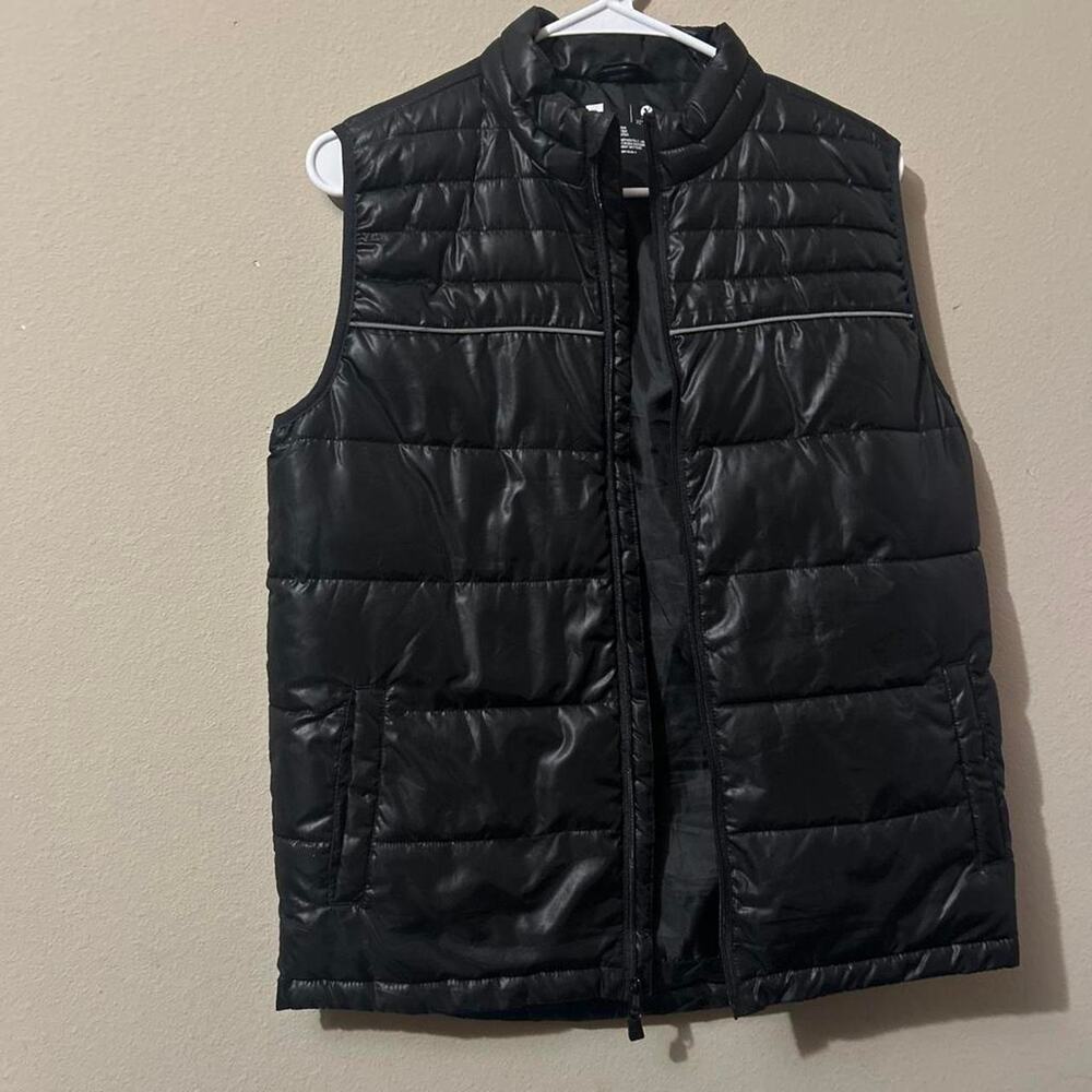 Black puffer vest with horizontal